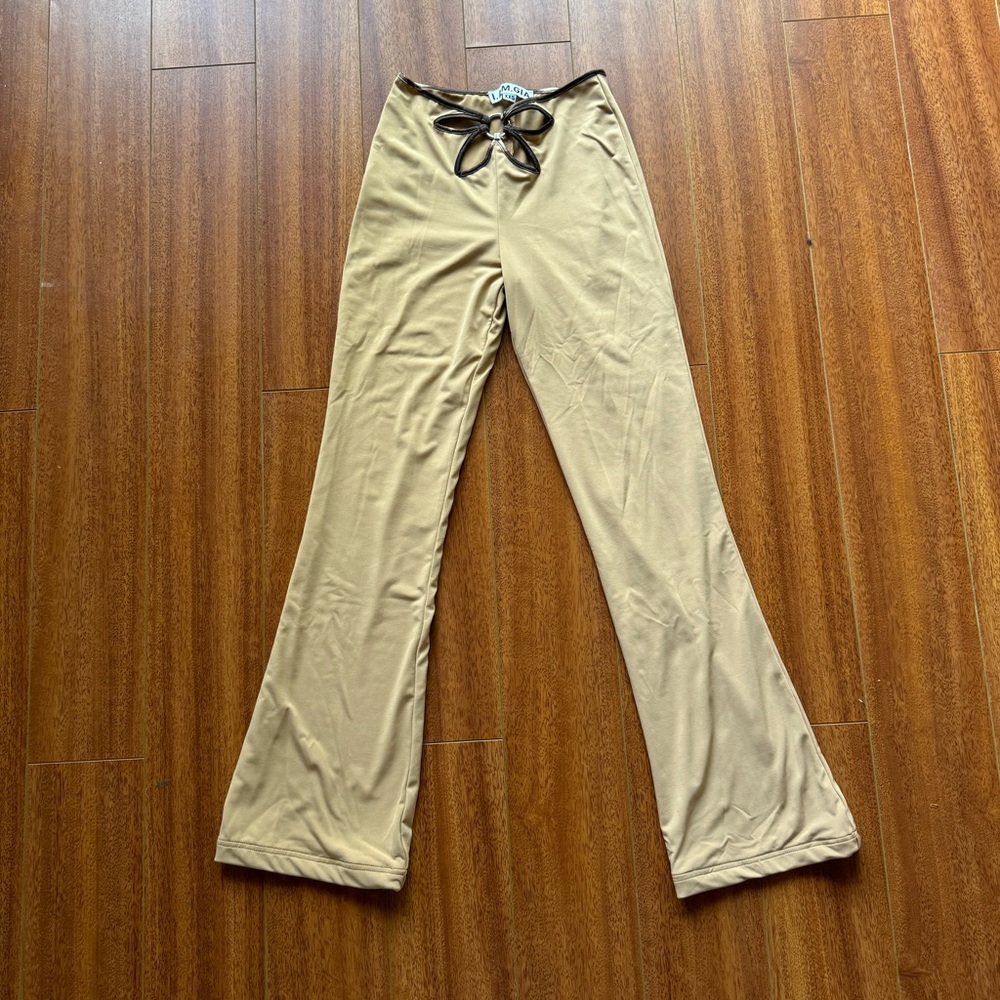 tan cut out pants